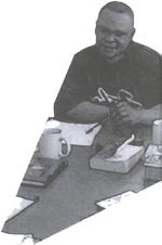 graphic - man working at a table